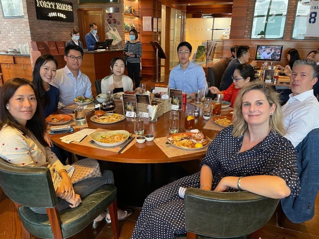 Members around a table at a casual Club lunch